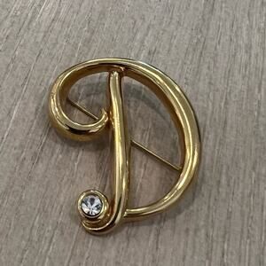 Vintage Monet D letter rhinestone brooch